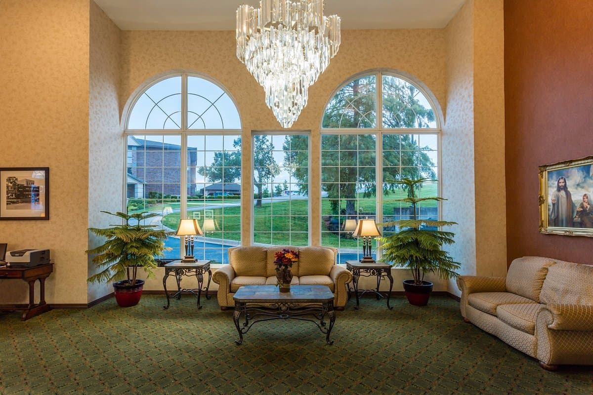 Lobby sitting area at Angel Inn Central with comfortable seating and warm lighting