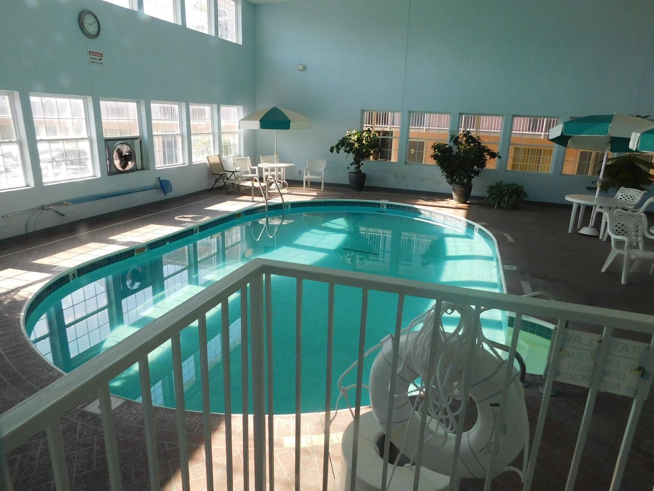 Indoor pool at Angel Inn Central with bright natural light and inviting water