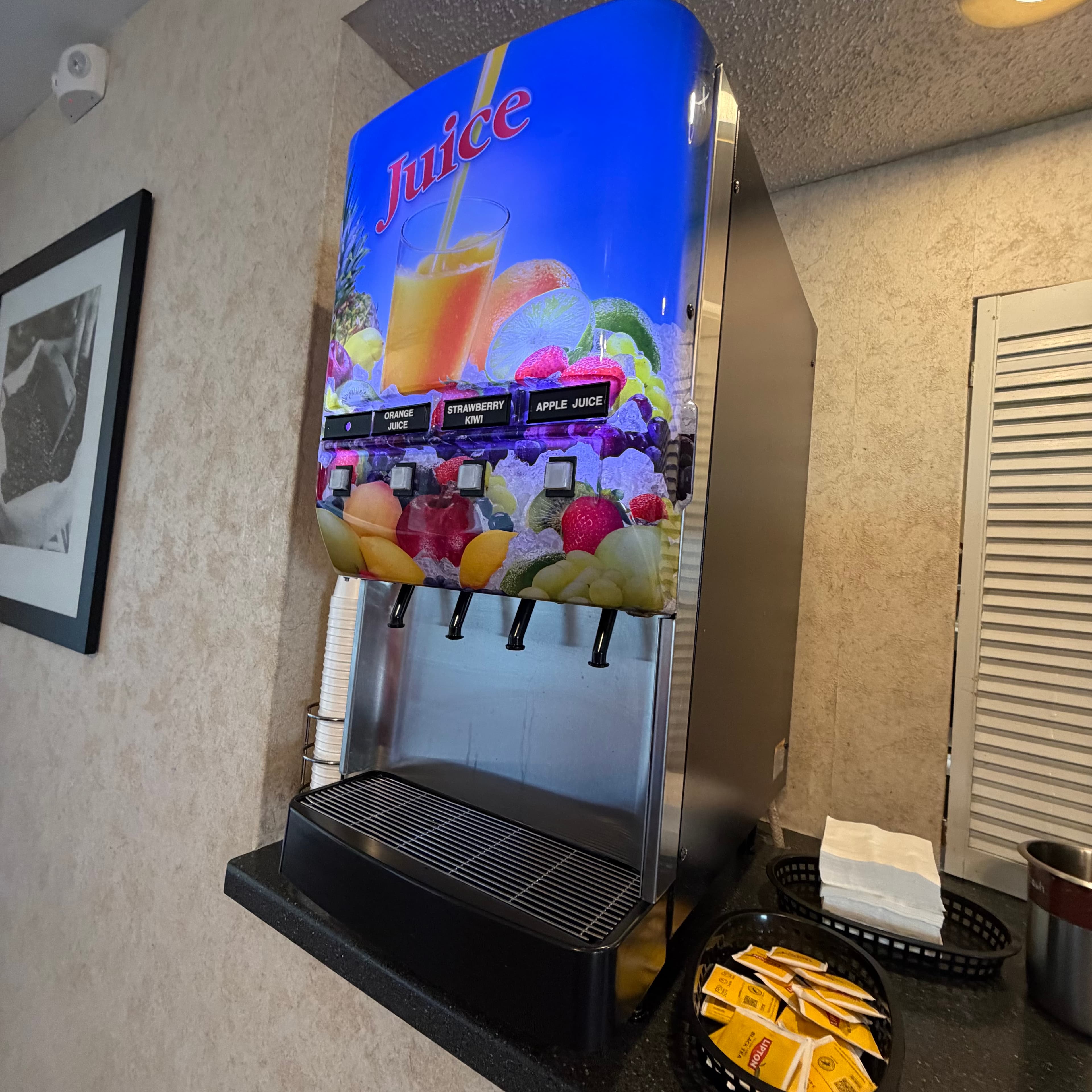 Juice dispenser in the breakfast area at Angel Inn Central